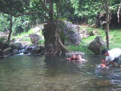 Take a refreshing dip in one of the drop pools at Sarika Waterfall